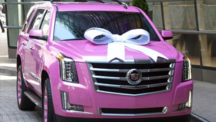 really spectacular present: a pink cadillac escalade