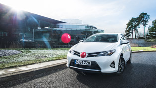 toyota raises awareness with red noses on its cars' logos